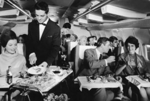 Cabin service on board an intercontinental Boeing 707 during a flight with the West German airline Lufthansa, 26th April 1967. (Photo by Fox Photos/Hulton Archive/Getty Images)